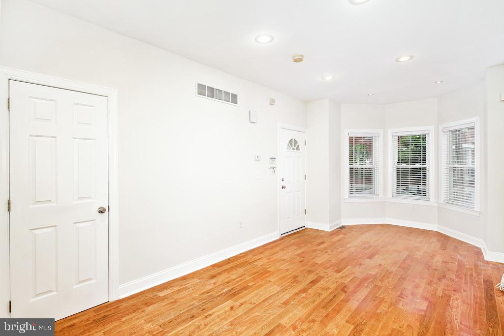 2339 Catharine Street, Unit 1 Philadelphia, PA 19146 - Photo 4 of 29 a bedroom with a bed and a window