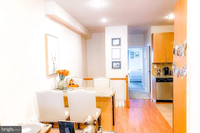 a view of kitchen and dining room with furniture