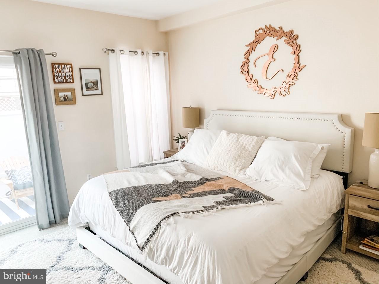 2339 Catharine Street, Unit 1 Philadelphia, PA 19146 - Photo 10 of 29 a bedroom with a bed and a window