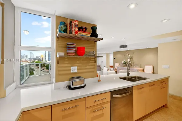 a en suite bathroom with a toilet sink and mirror