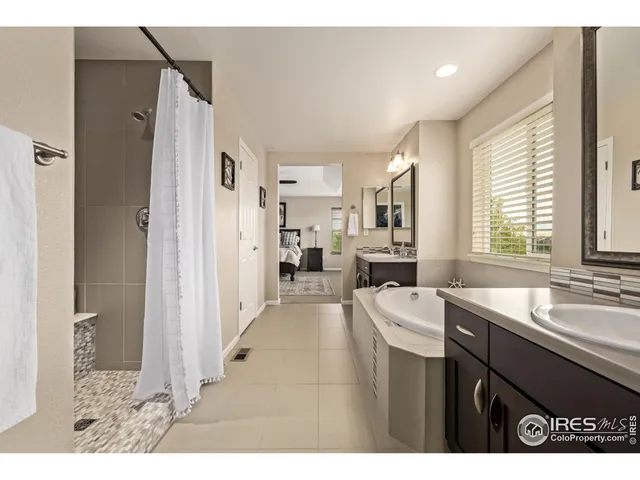 a open kitchen with sink refrigerator and window