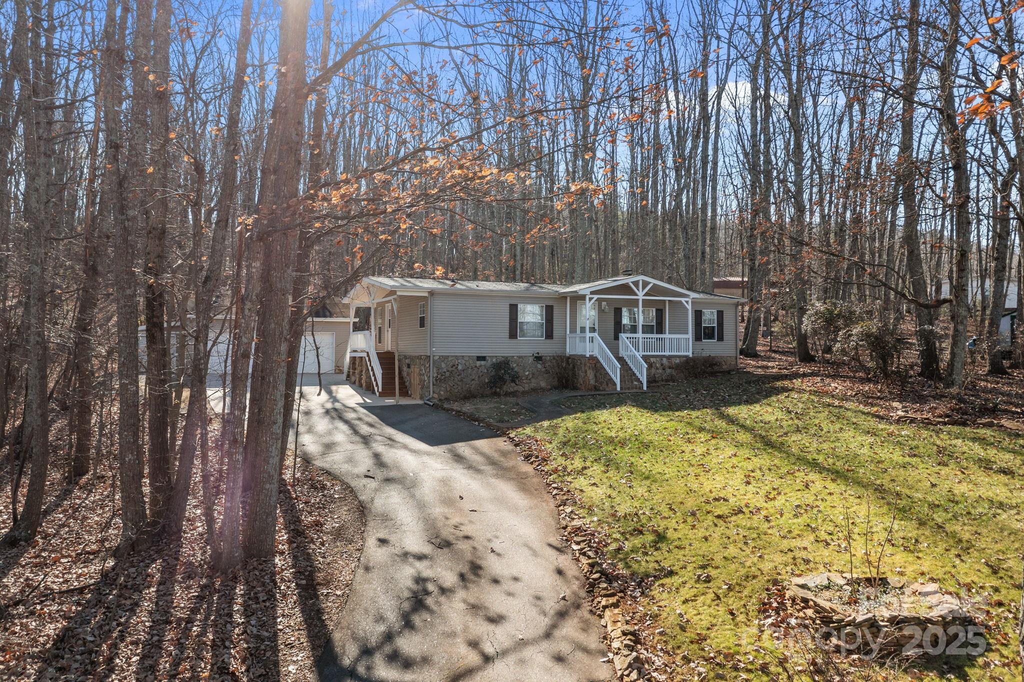 5043 Pebble Stone Road Maiden, NC 28650 - Photo 14 of 46 a view of balcony with two trees