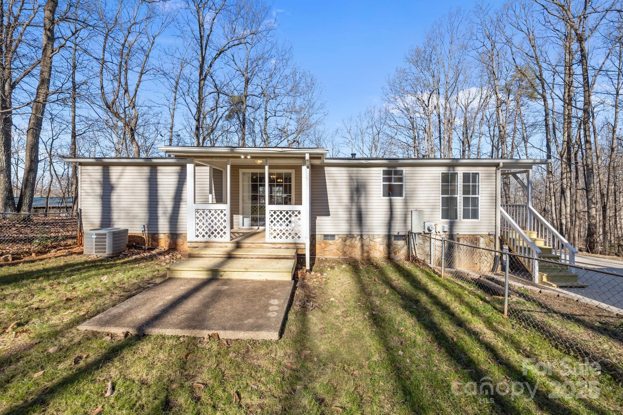 5043 Pebble Stone Road Maiden, NC 28650 - Photo 16 of 46 front view of house with a yard