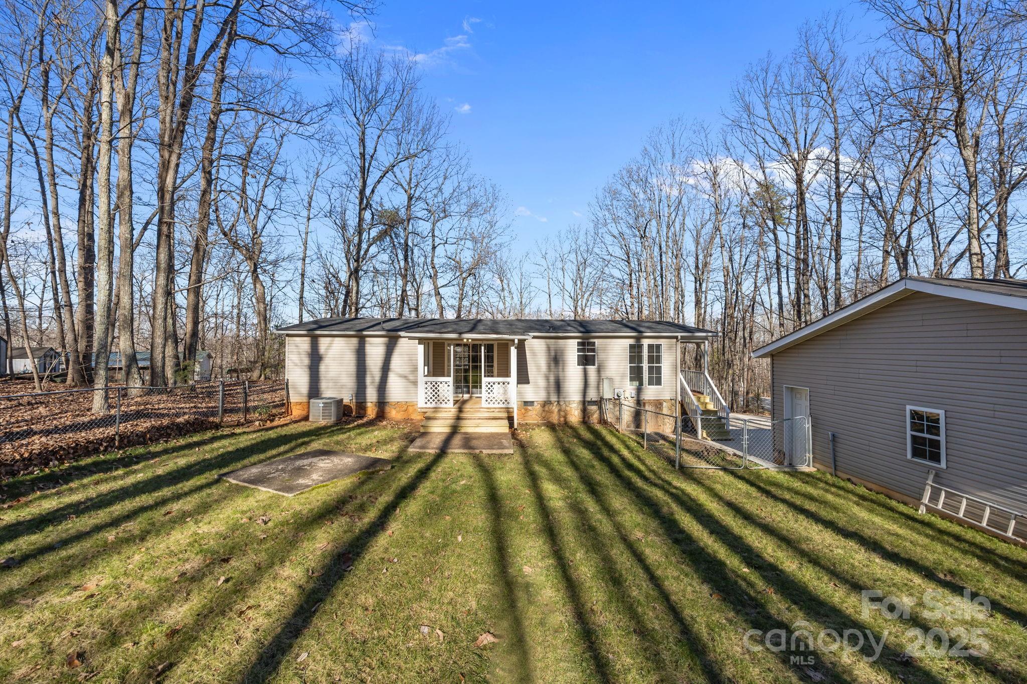 5043 Pebble Stone Road Maiden, NC 28650 - Photo 17 of 46 a view of a house with a large pool