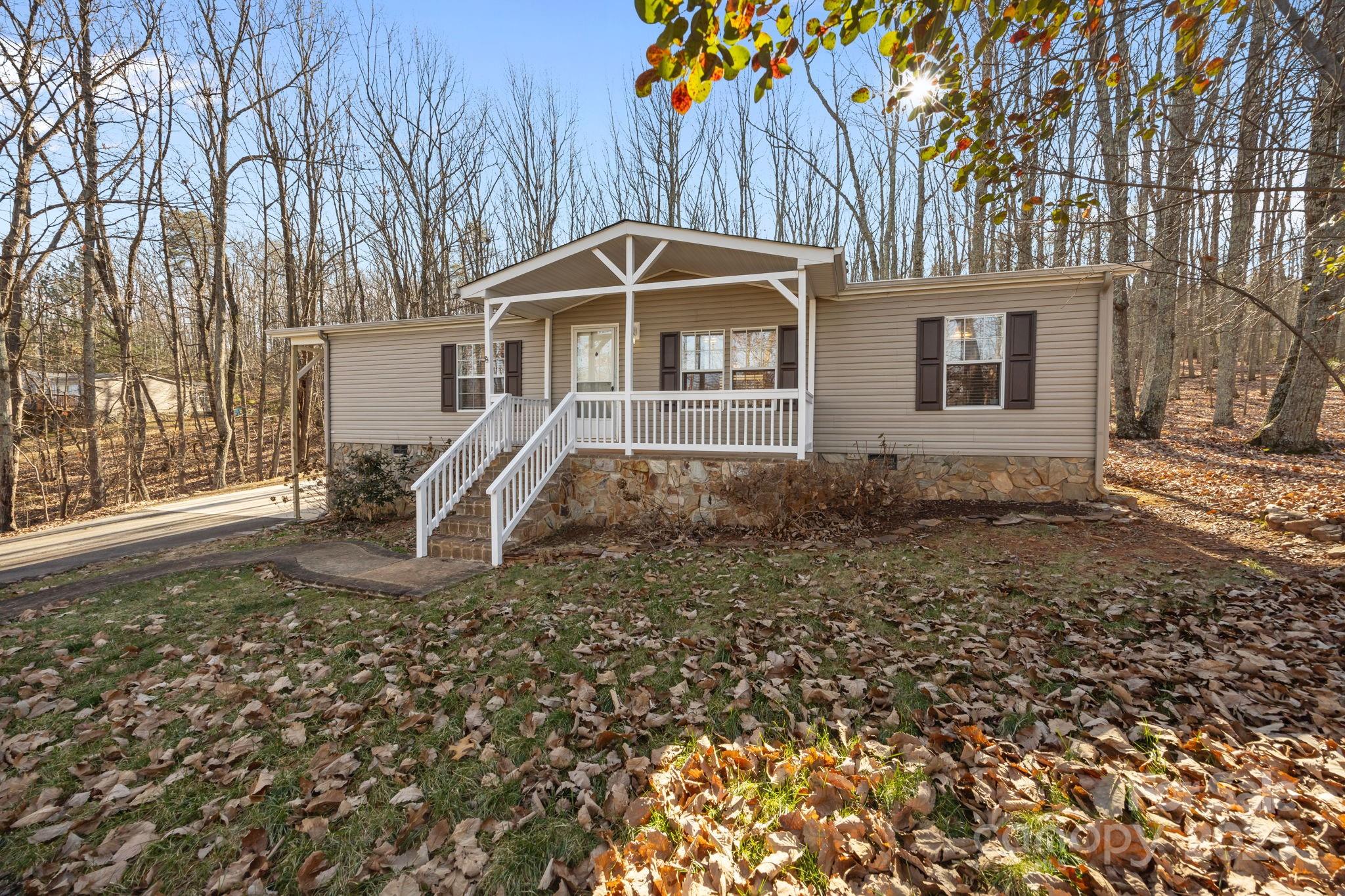 5043 Pebble Stone Road Maiden, NC 28650 - Photo 2 of 46 a front view of a house with a yard