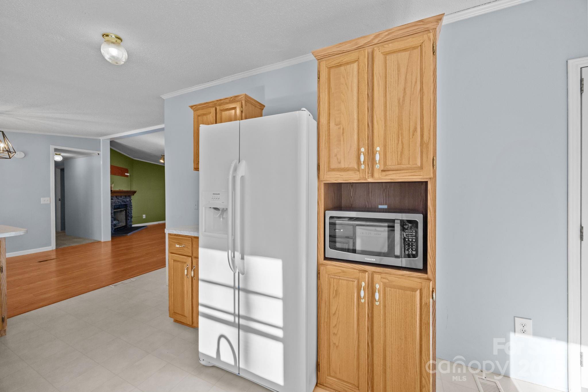 5043 Pebble Stone Road Maiden, NC 28650 - Photo 34 of 46 a kitchen with stainless steel appliances granite countertop a refrigerator and a stove top oven