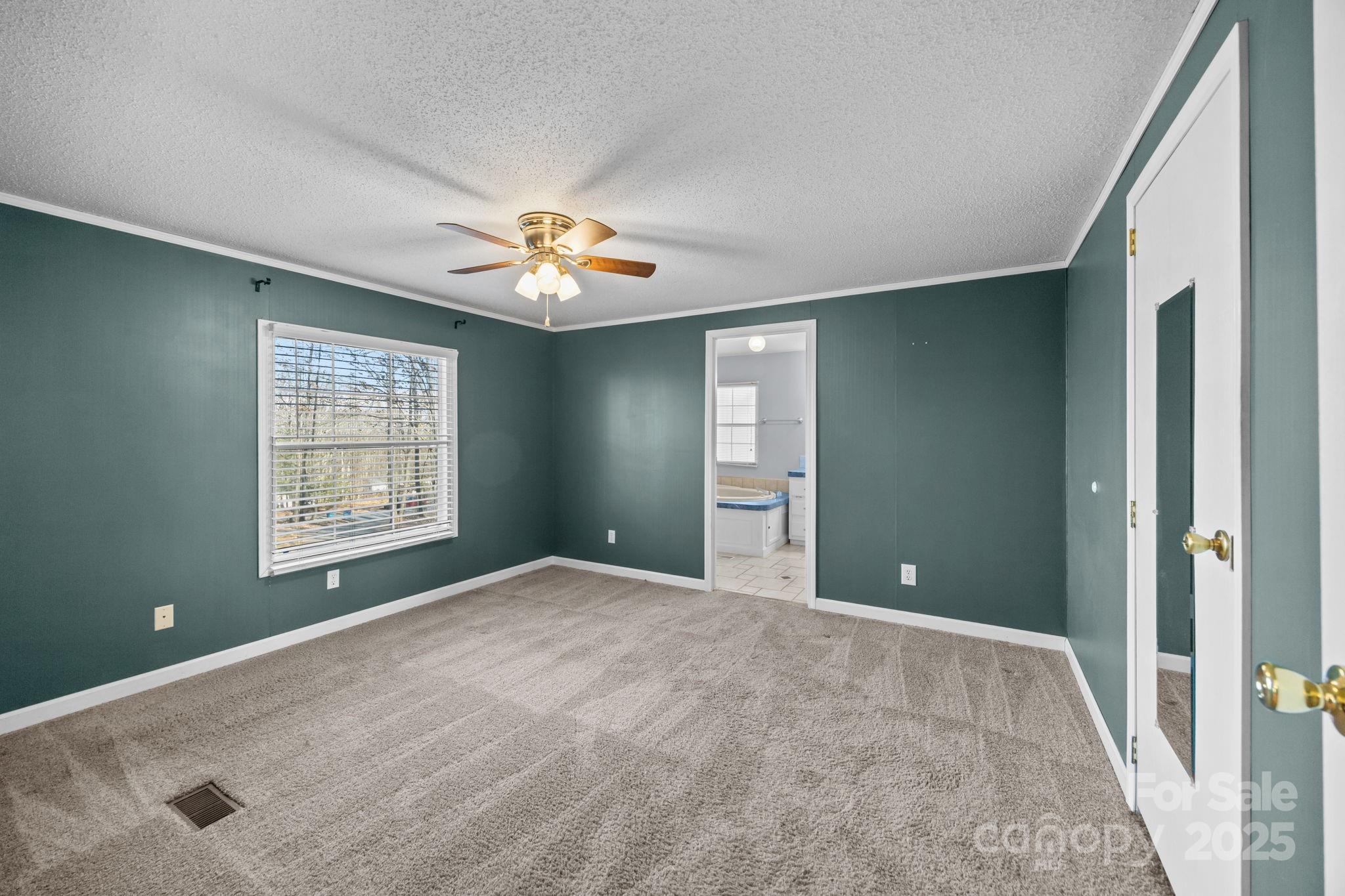 5043 Pebble Stone Road Maiden, NC 28650 - Photo 37 of 46 a view of an empty room with a window