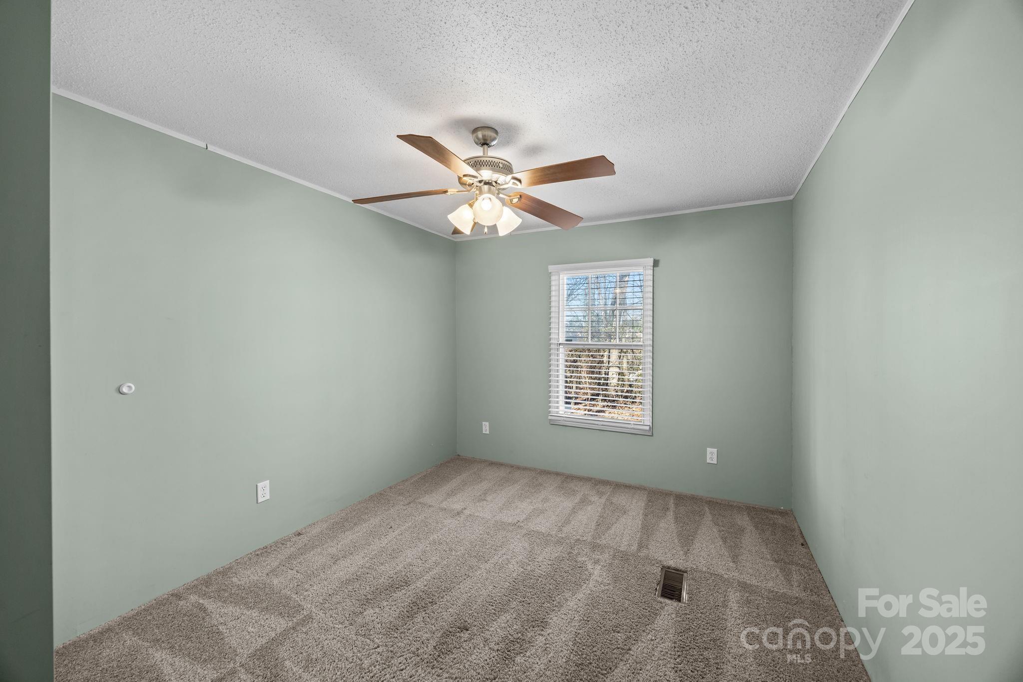 5043 Pebble Stone Road Maiden, NC 28650 - Photo 41 of 46 a view of an empty room with a window