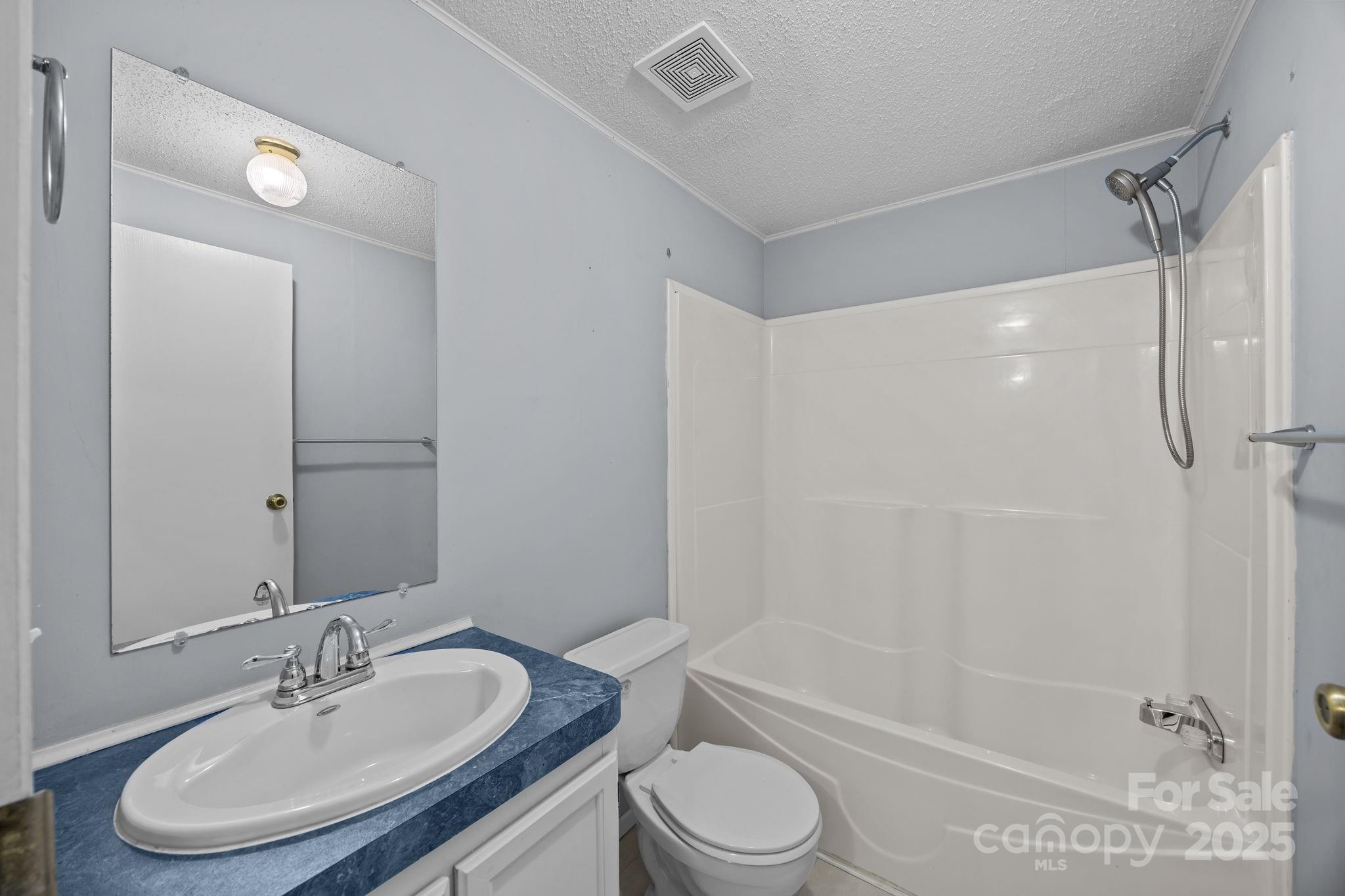 5043 Pebble Stone Road Maiden, NC 28650 - Photo 43 of 46 a bathroom with a sink toilet and shower