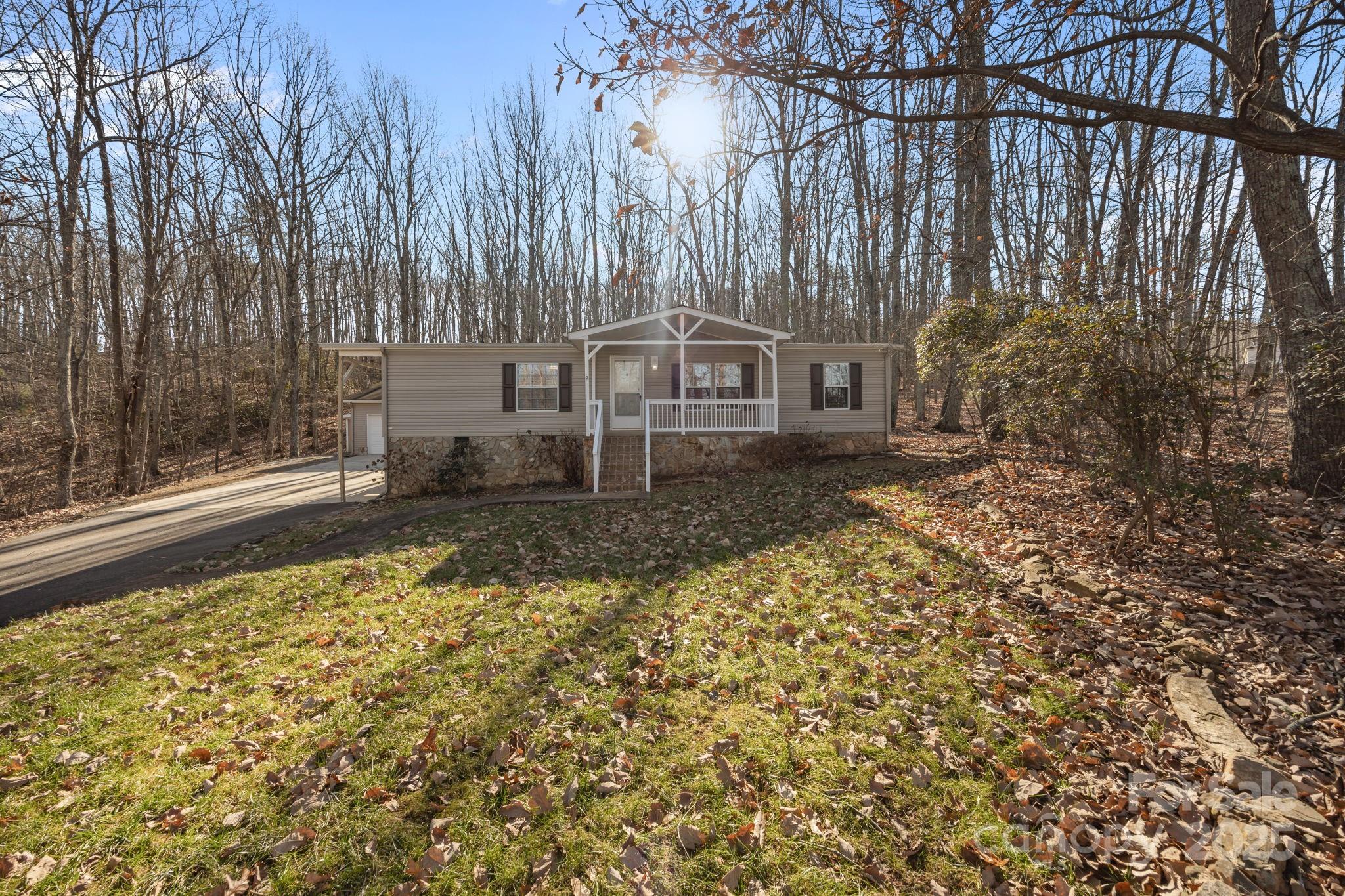 5043 Pebble Stone Road Maiden, NC 28650 - Photo 5 of 46 front view of a house with a yard