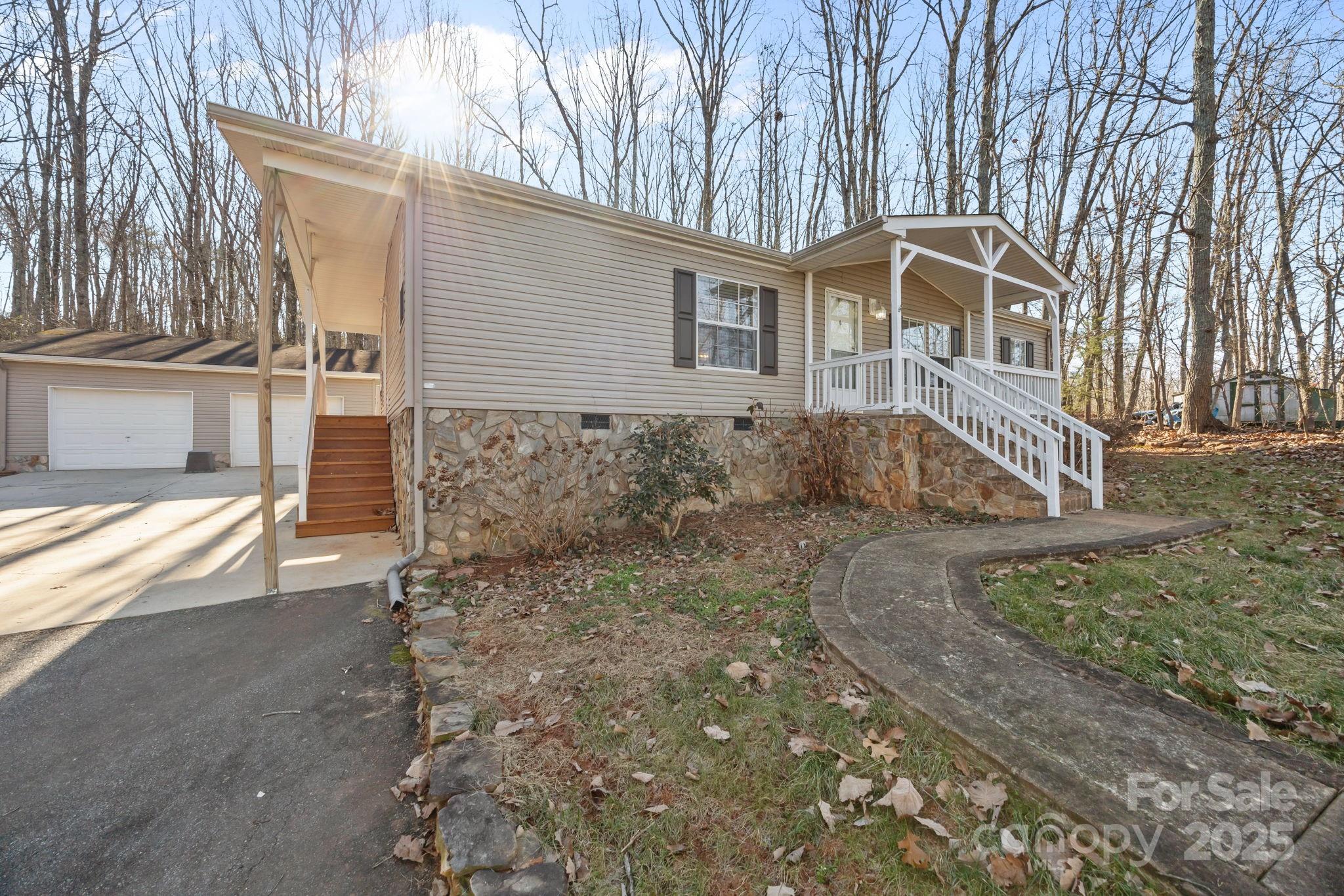 5043 Pebble Stone Road Maiden, NC 28650 - Photo 6 of 46 a front view of a house with garden
