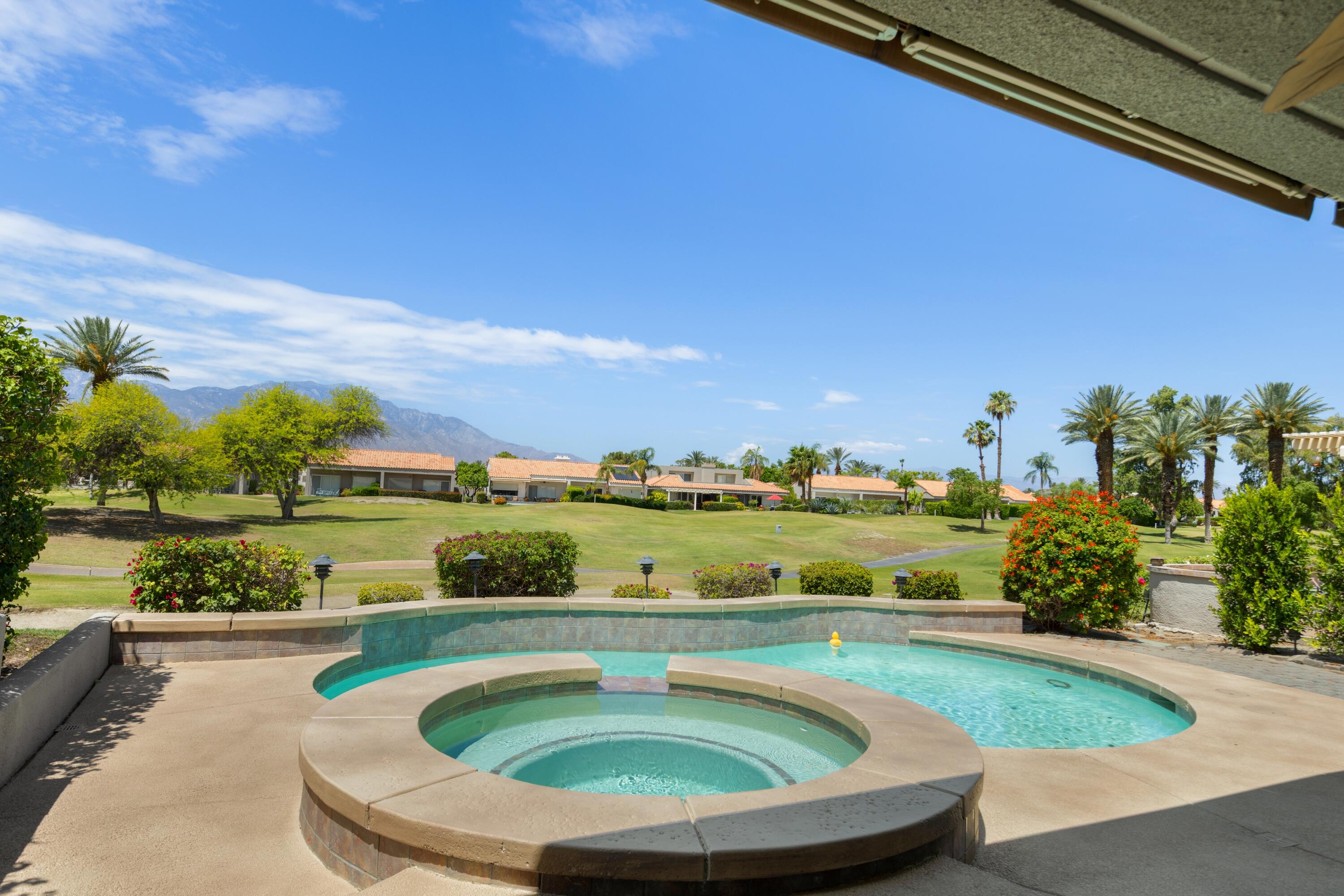 39 Augusta Drive Rancho Mirage, CA 92270 - Photo 51 of 53 a view of swimming pool with outdoor seating and plants
