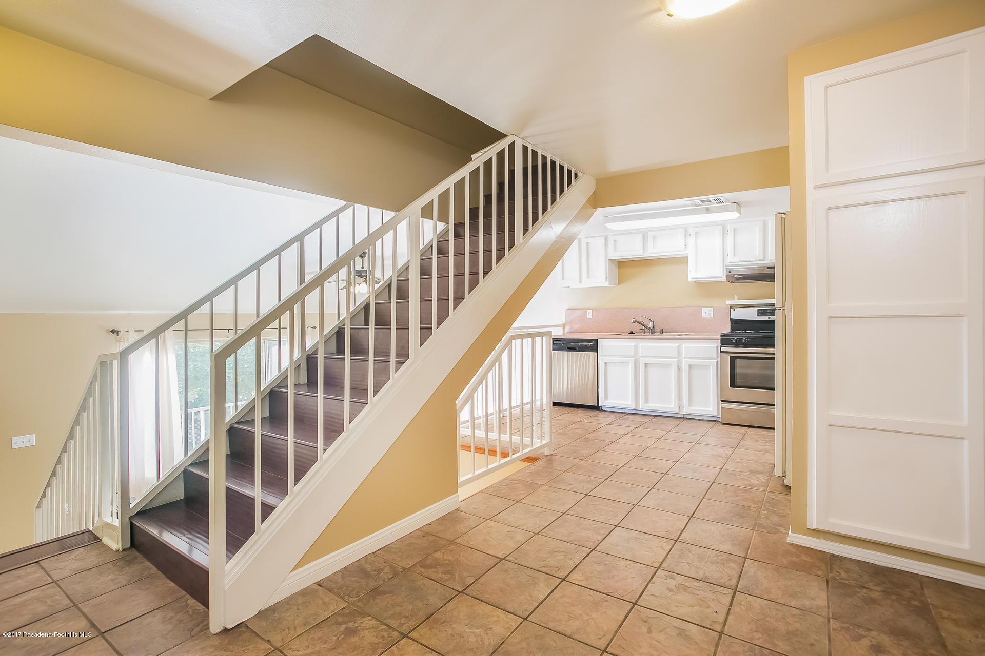 248 East Washington Boulevard, Unit 4 Pasadena, CA 91104 - Photo 5 of 19 a view of a hallway with staircase