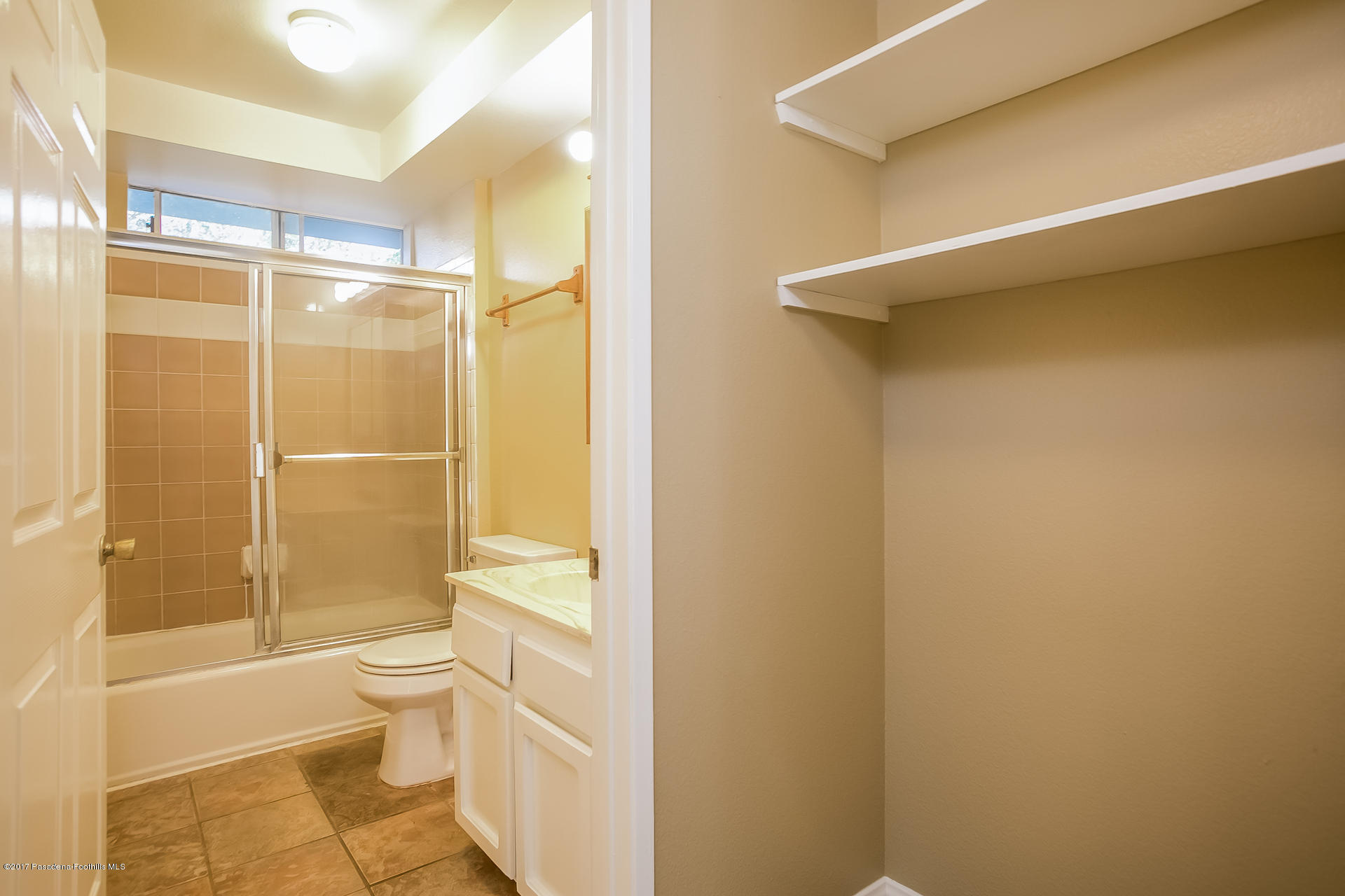 248 East Washington Boulevard, Unit 4 Pasadena, CA 91104 - Photo 9 of 19 a bathroom with a bathtub and a toilet