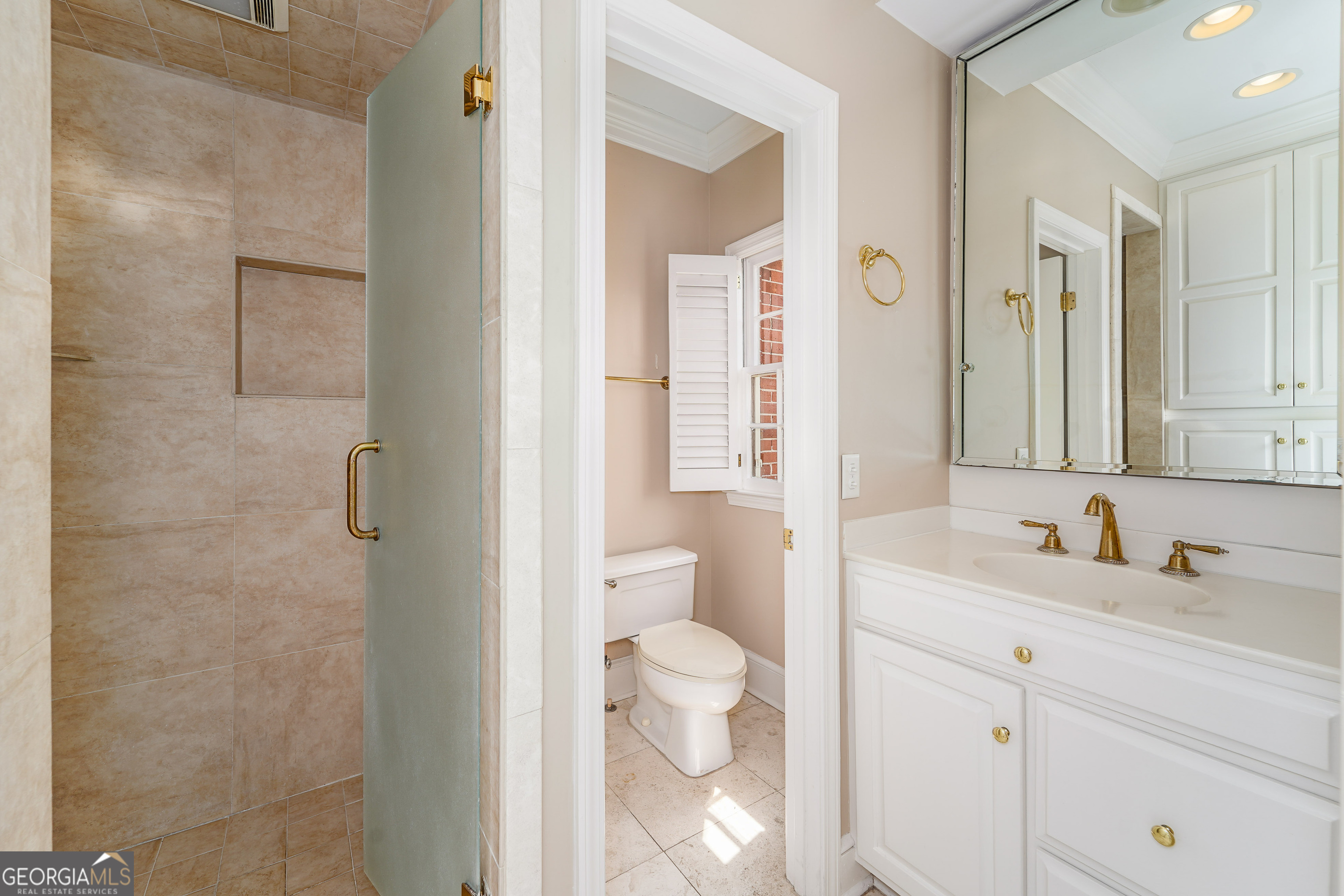 1602 Ward St Extension West Douglas, GA 31533 - Photo 58 of 70 a bathroom with a sink a toilet and a mirror