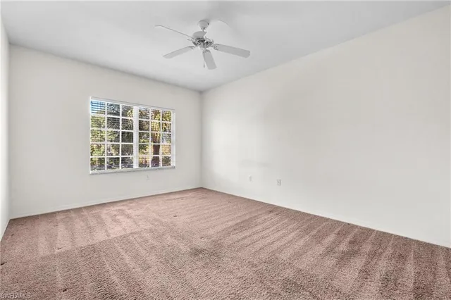 a kitchen with a refrigerator stove and sink