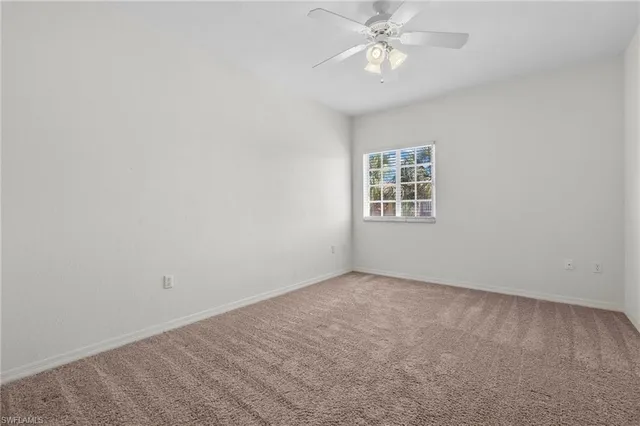 an empty room with a bathroom