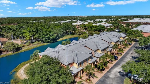 a front view of a house with small garden