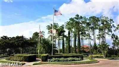 an aerial view of a residential houses with city and ocean view