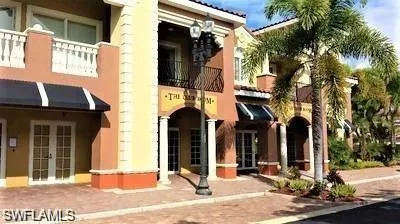 a view of a park with a tree