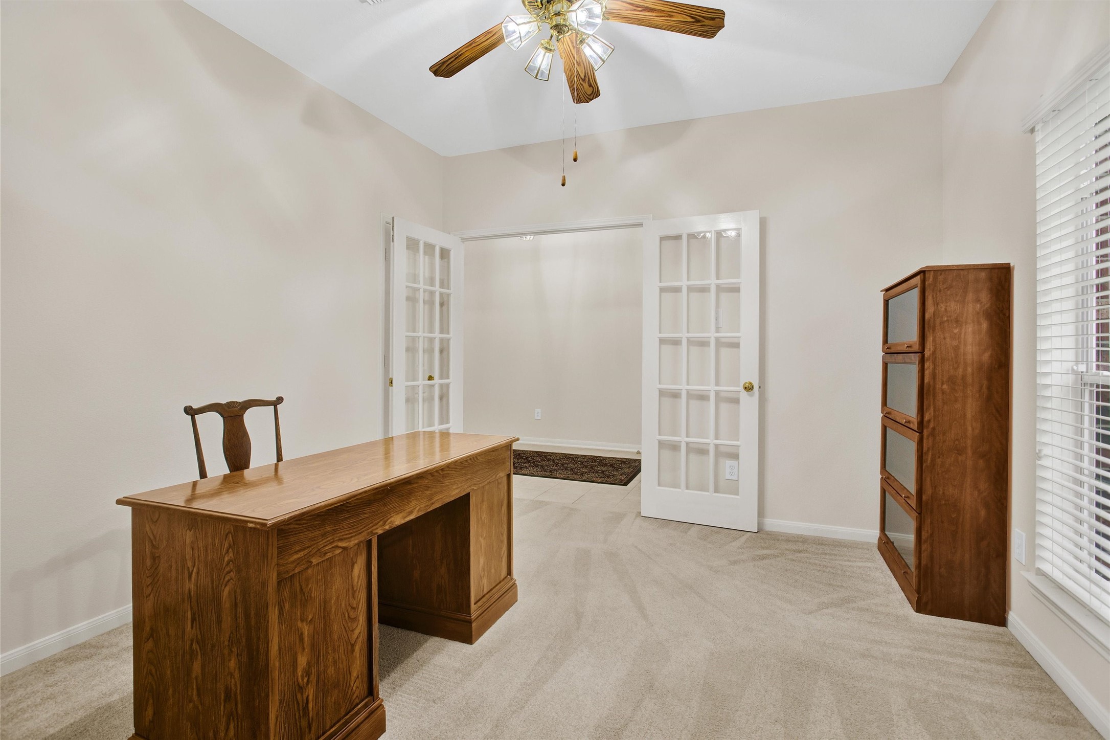 6031 Skyhaven Lane Spring, TX 77379 - Photo 6 of 33 Glass French doors offer privacy.