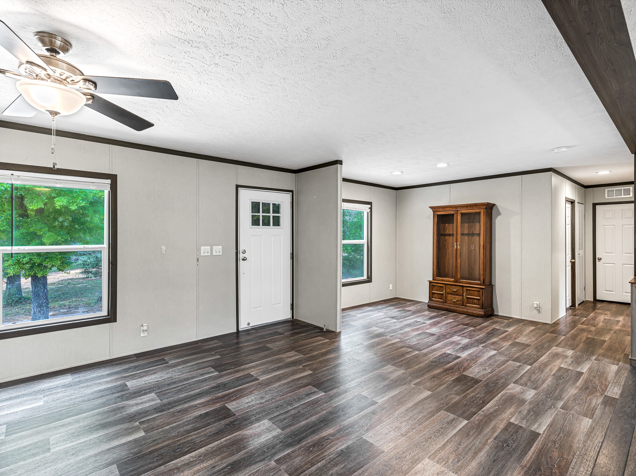 1047 Jimbob Lane New Ulm, TX 78950 - Photo 6 of 18 Alternate view of the living area shows the seamless transition into this flex space that can be used as a dining room, an office or whatever your heart desires!