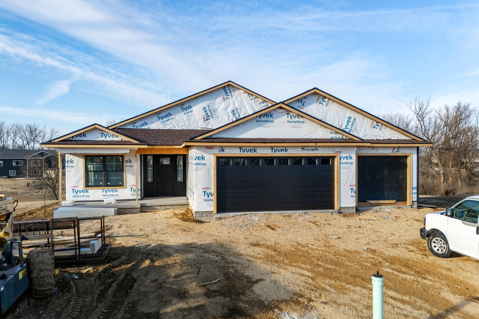 18116 271st Street Long Grove, IA 52756 - Photo 1 of 21 a front view of a house with yard and porch