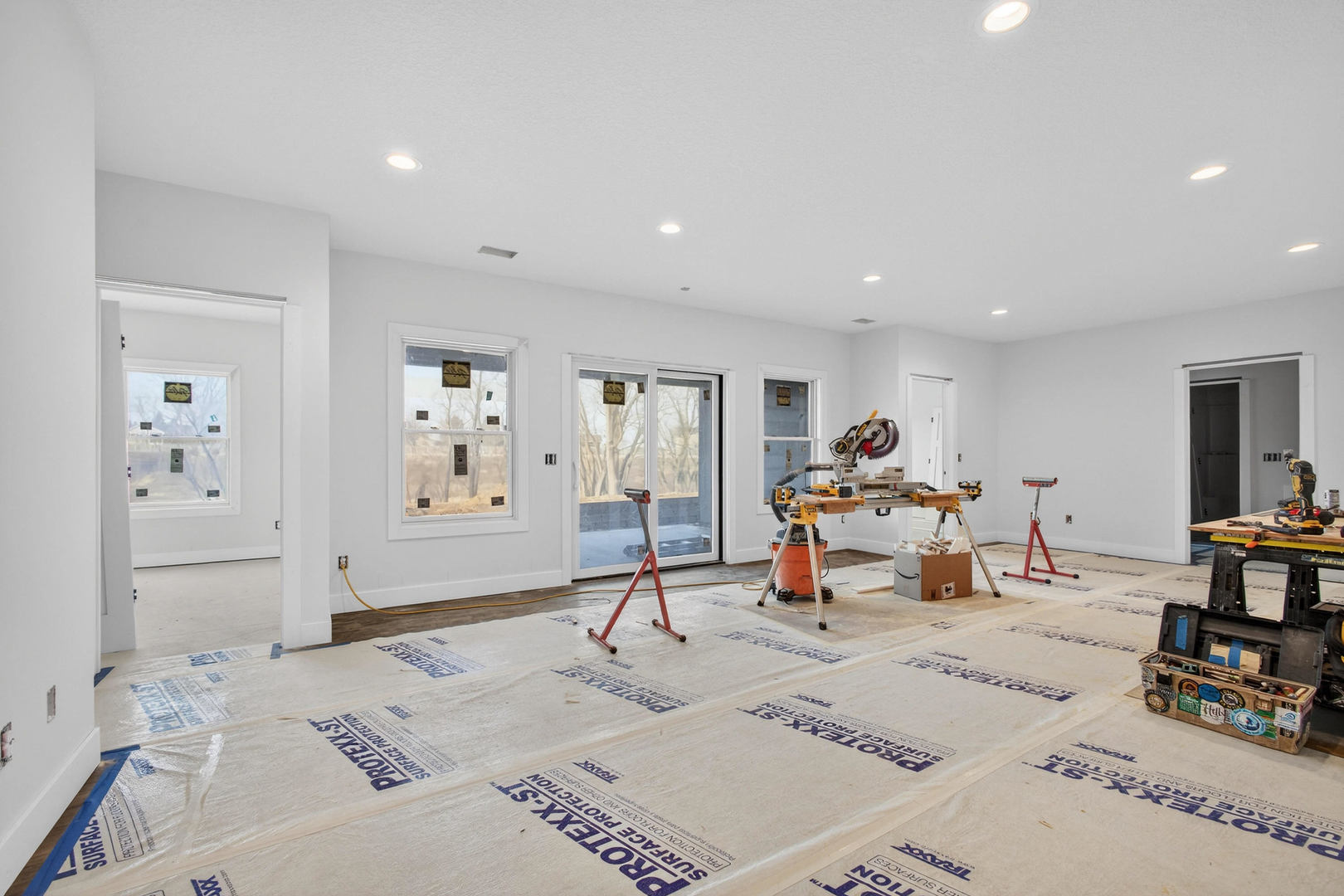 18116 271st Street Long Grove, IA 52756 - Photo 12 of 21 a living room with furniture and wooden floor