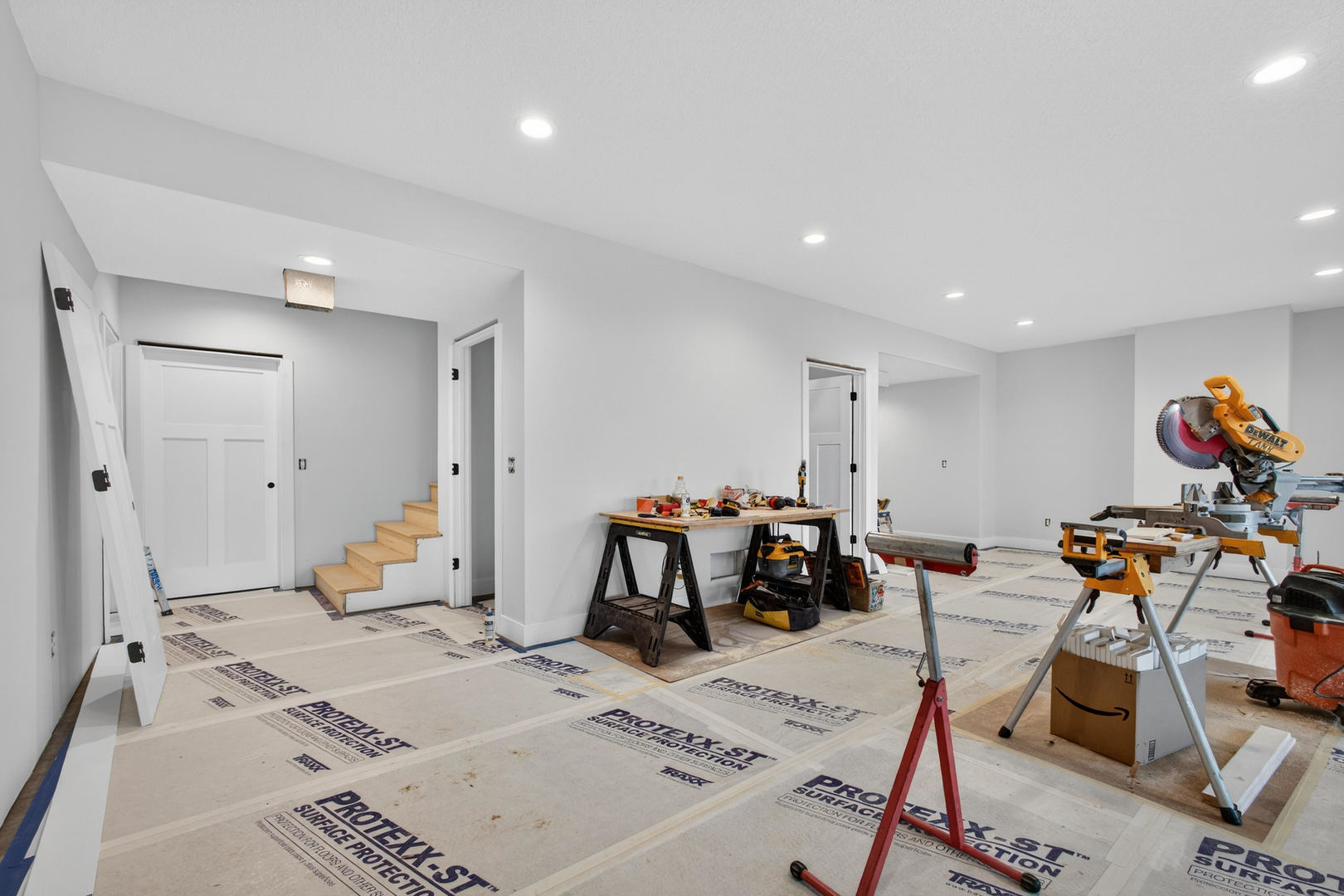 18116 271st Street Long Grove, IA 52756 - Photo 13 of 21 a living room with furniture and gym equipment