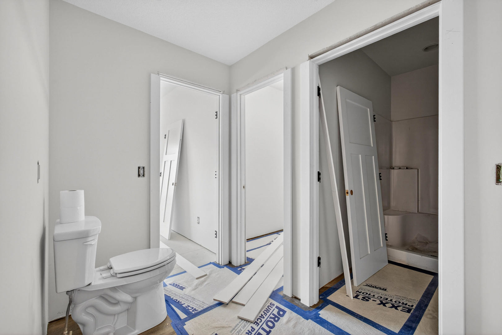 18116 271st Street Long Grove, IA 52756 - Photo 14 of 21 a bathroom with a toilet and a shower