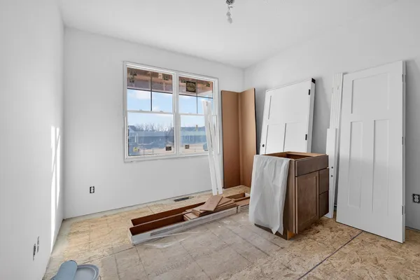 an empty room with windows