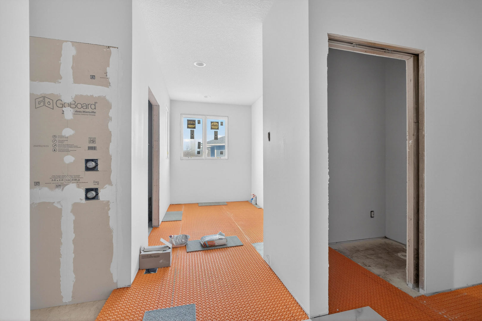 18116 271st Street Long Grove, IA 52756 - Photo 8 of 21 a bedroom with a bed and glass door