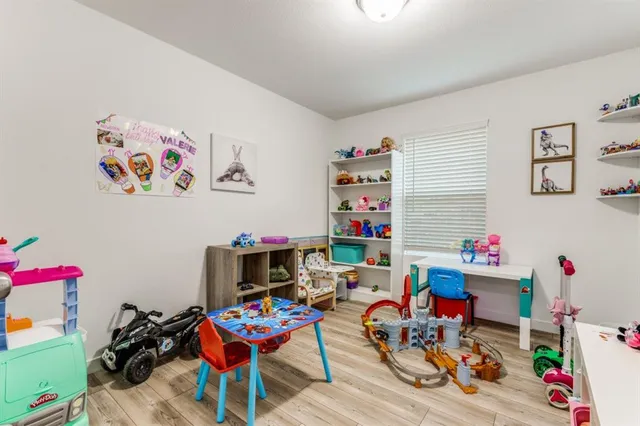 a room with furniture and toys