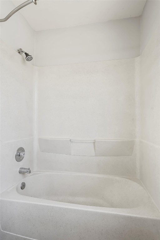 25600 Ronald Reagan Boulevard Georgetown, TX 78633 - Photo 30 of 36 a bathroom with bathtub