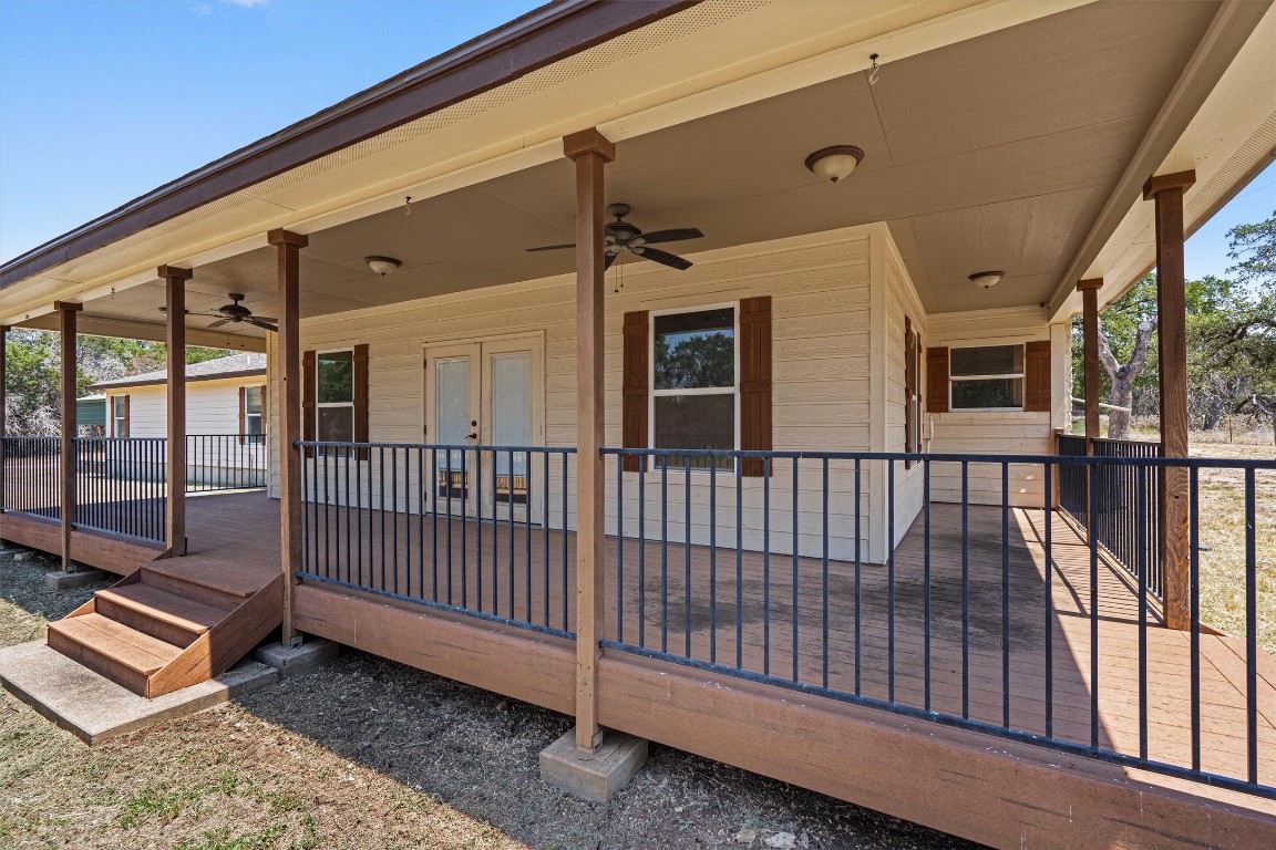 25600 Ronald Reagan Boulevard Georgetown, TX 78633 - Photo 32 of 36 a view of a porch with wooden floor and fence