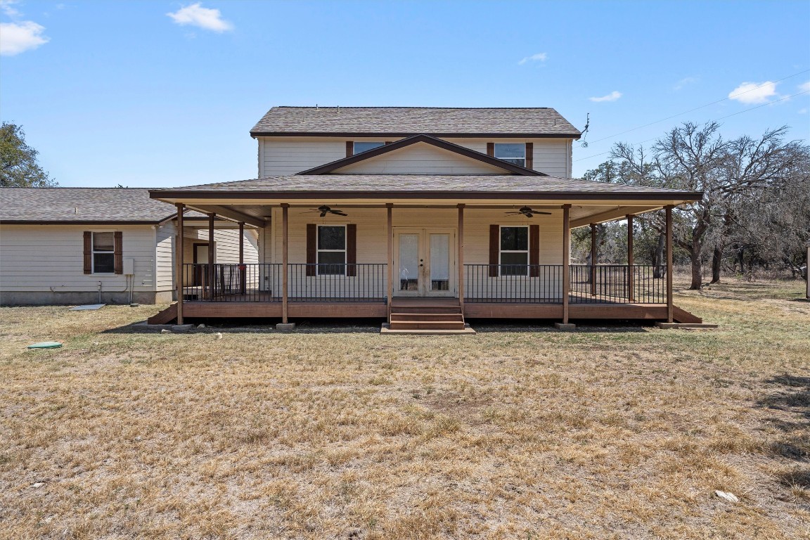 25600 Ronald Reagan Boulevard Georgetown, TX 78633 - Photo 33 of 36 front view of a house with a yard