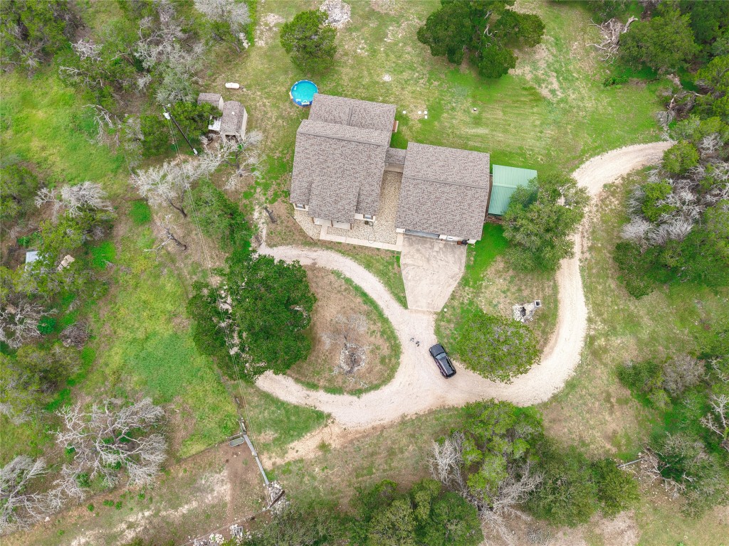 25600 Ronald Reagan Boulevard Georgetown, TX 78633 - Photo 10 of 36 an aerial view of residential house with outdoor space and trees all around