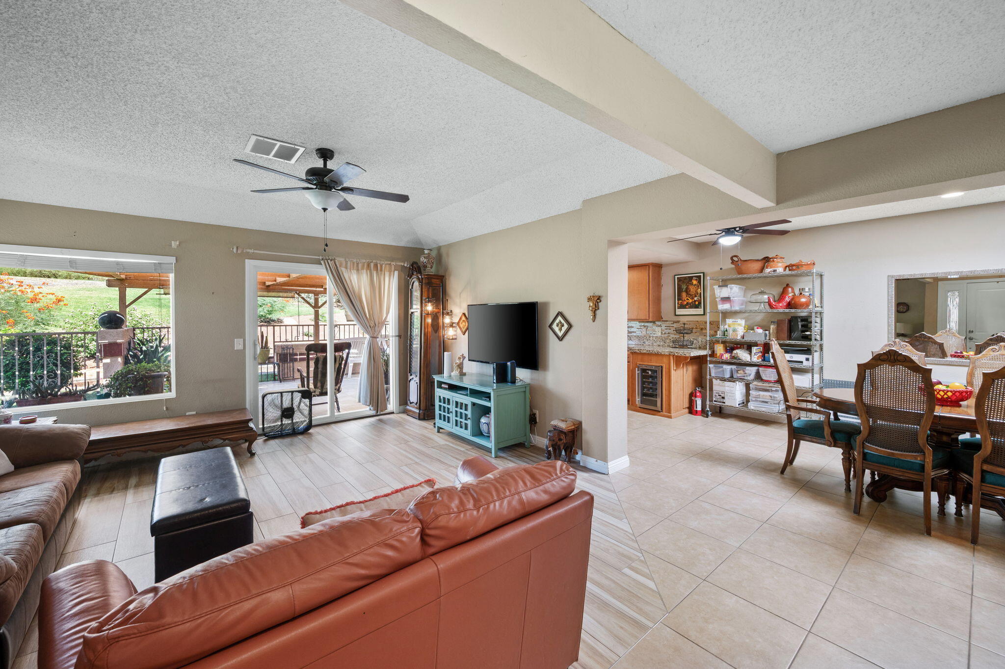 49275 Douglas Street Indio, CA 92201 - Photo 2 of 37 a living room with furniture and a large window