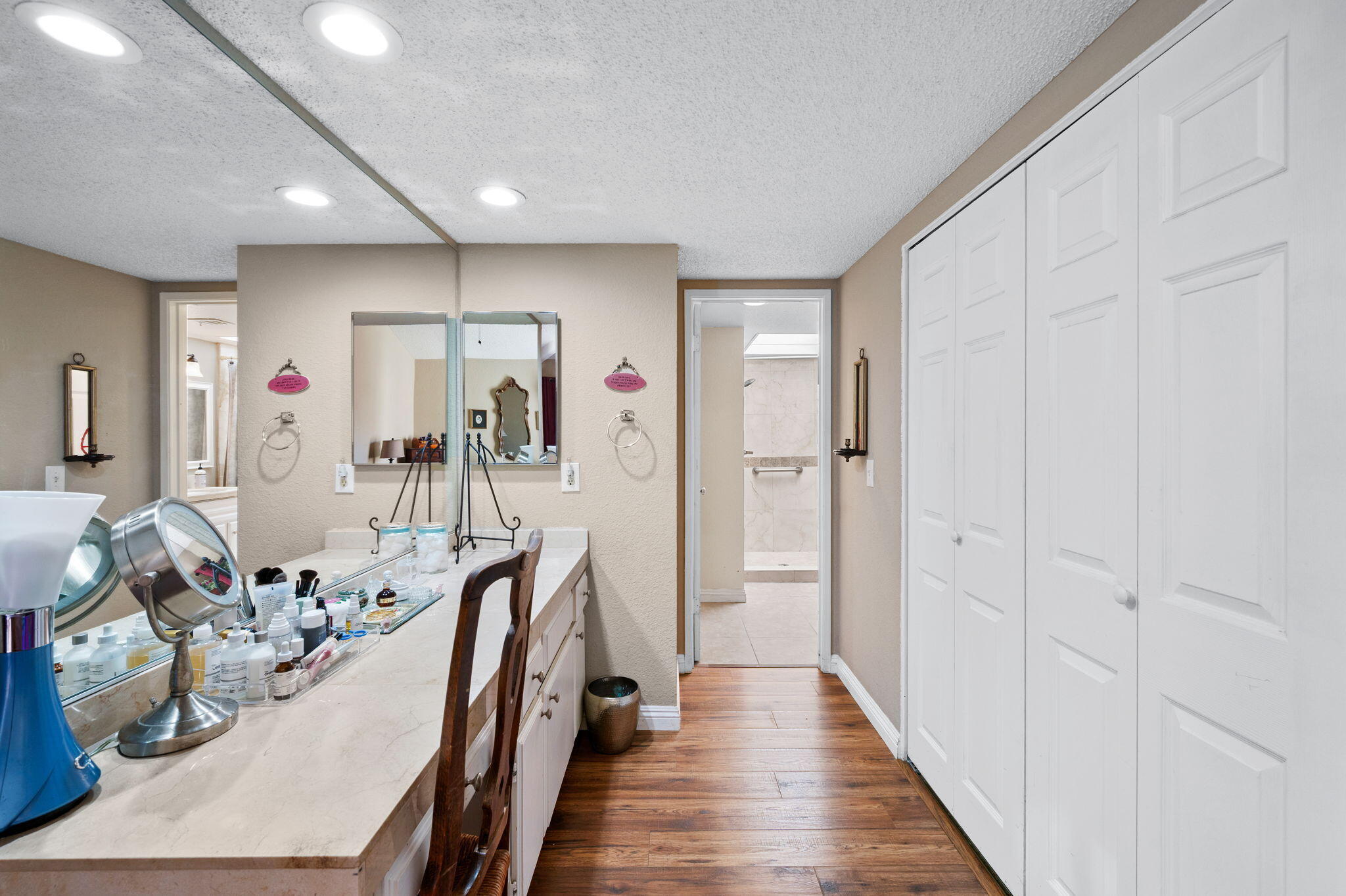 49275 Douglas Street Indio, CA 92201 - Photo 21 of 37 a hallway with wooden floor and furniture