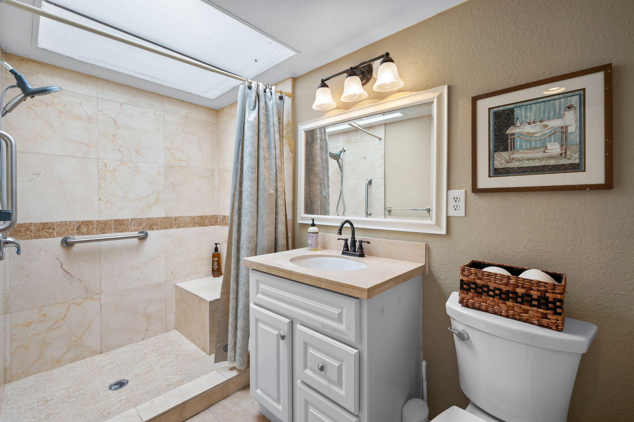 49275 Douglas Street Indio, CA 92201 - Photo 22 of 37 a bathroom with a sink a toilet and shower