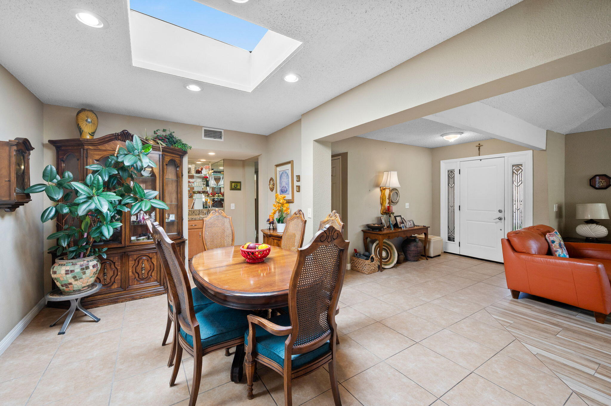 49275 Douglas Street Indio, CA 92201 - Photo 7 of 37 a living room with furniture and a dining table