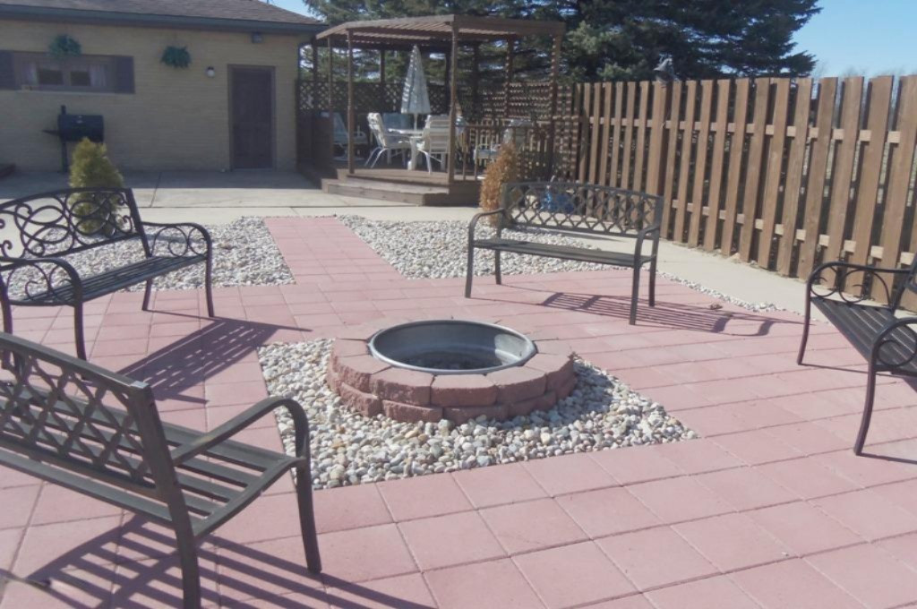 1920 South Stone Road Fremont, MI 49412 - Photo 2 of 32 Back fire pit area