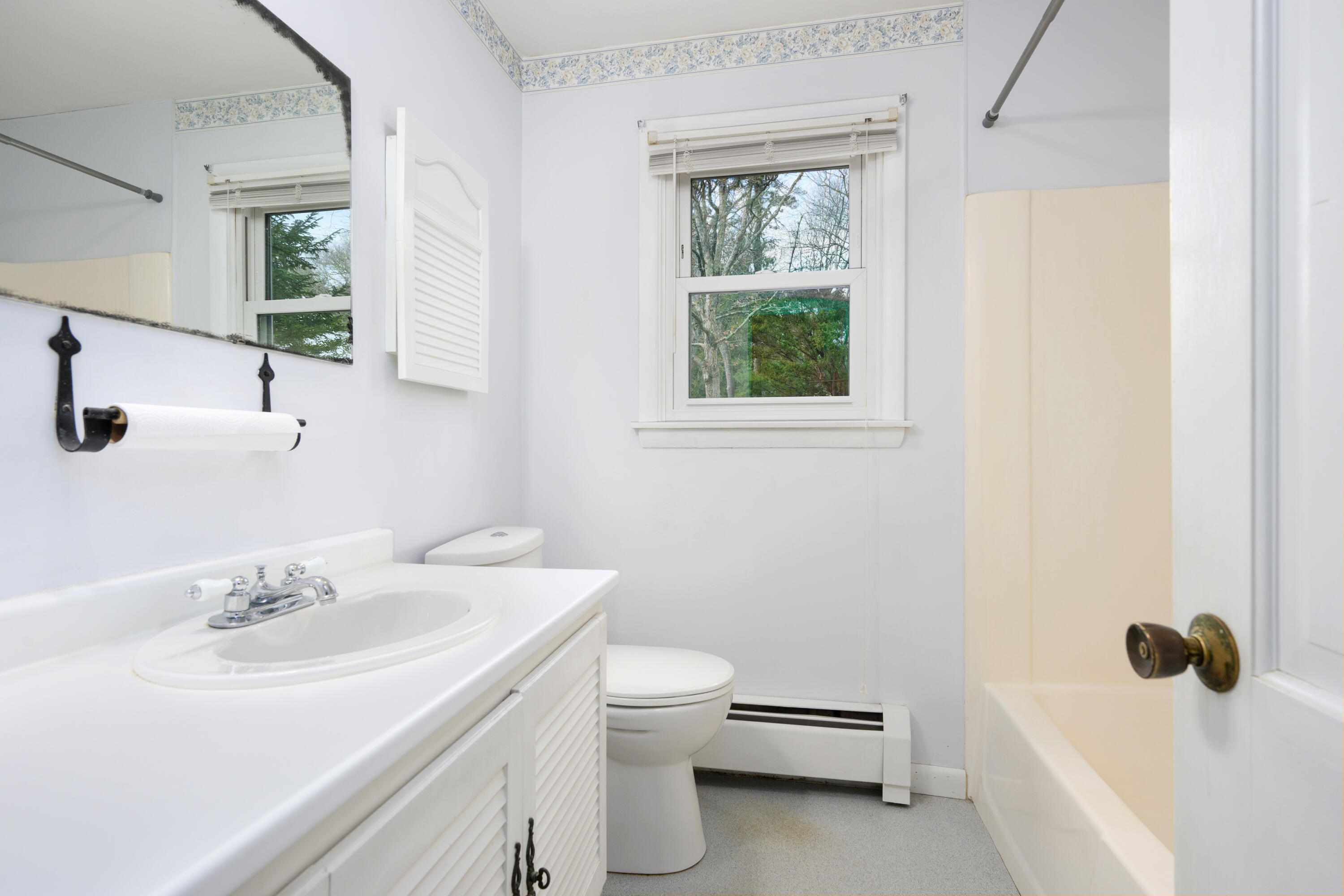 33 Head Of The Bay Road Buzzards Bay, MA 02532 - Photo 18 of 46 a bathroom with a sink toilet and a tub