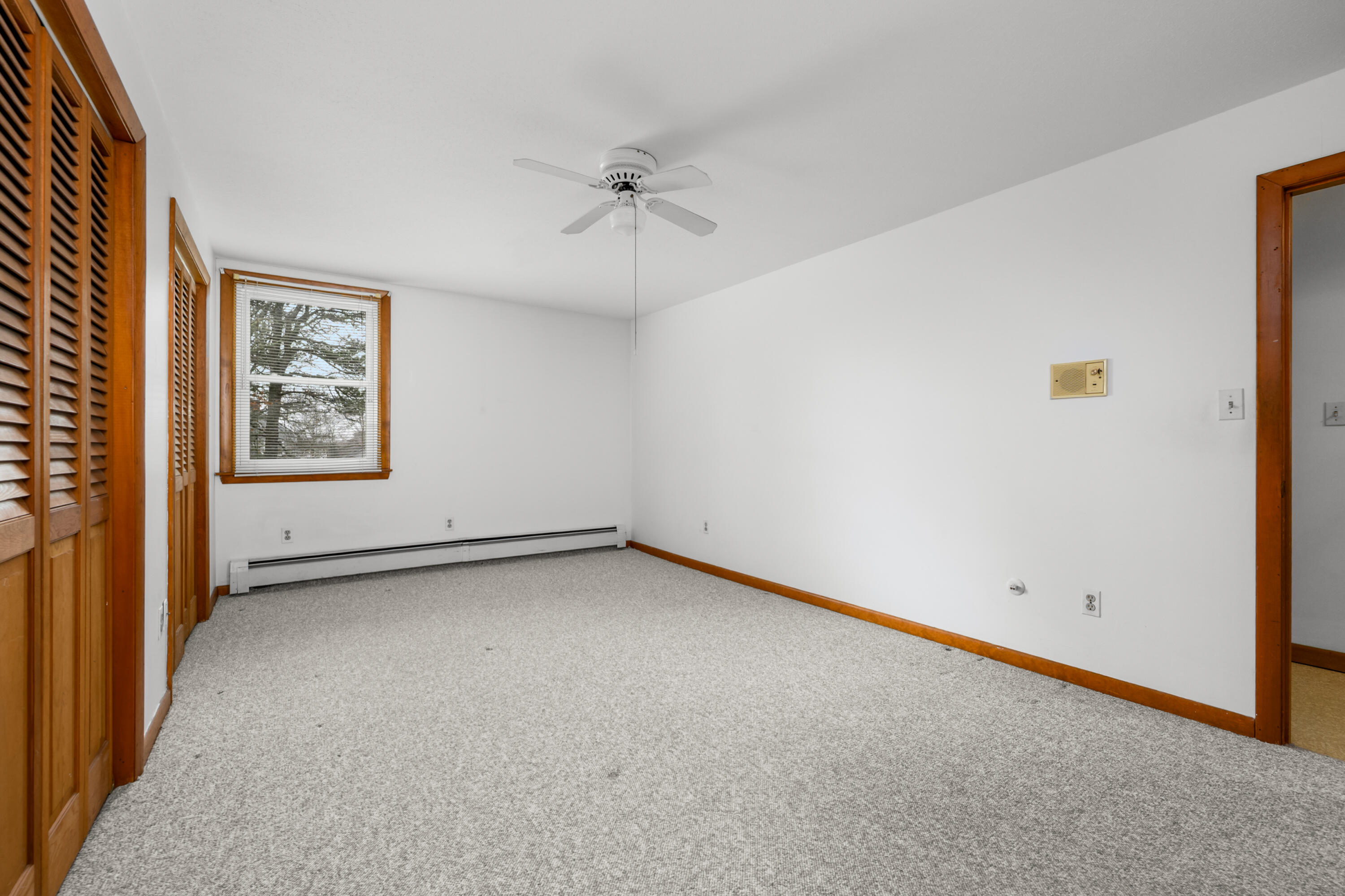 33 Head Of The Bay Road Buzzards Bay, MA 02532 - Photo 19 of 46 an empty room with a window