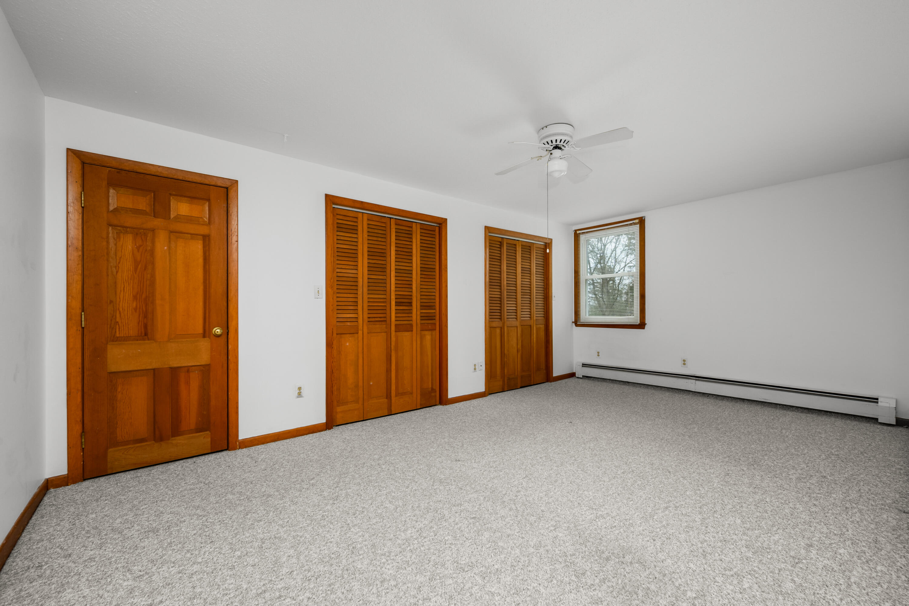 33 Head Of The Bay Road Buzzards Bay, MA 02532 - Photo 20 of 46 an empty room with windows and closet