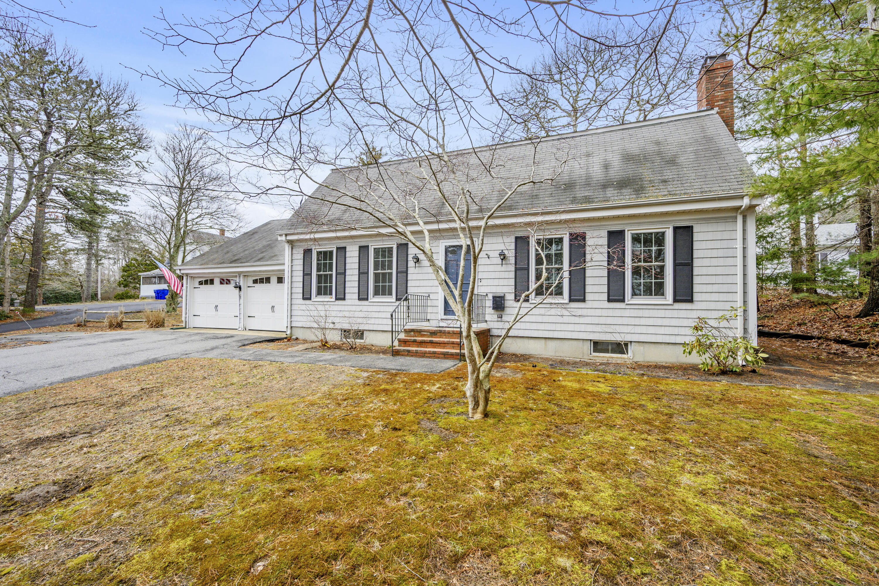 33 Head Of The Bay Road Buzzards Bay, MA 02532 - Photo 31 of 46 a front view of a house with a yard
