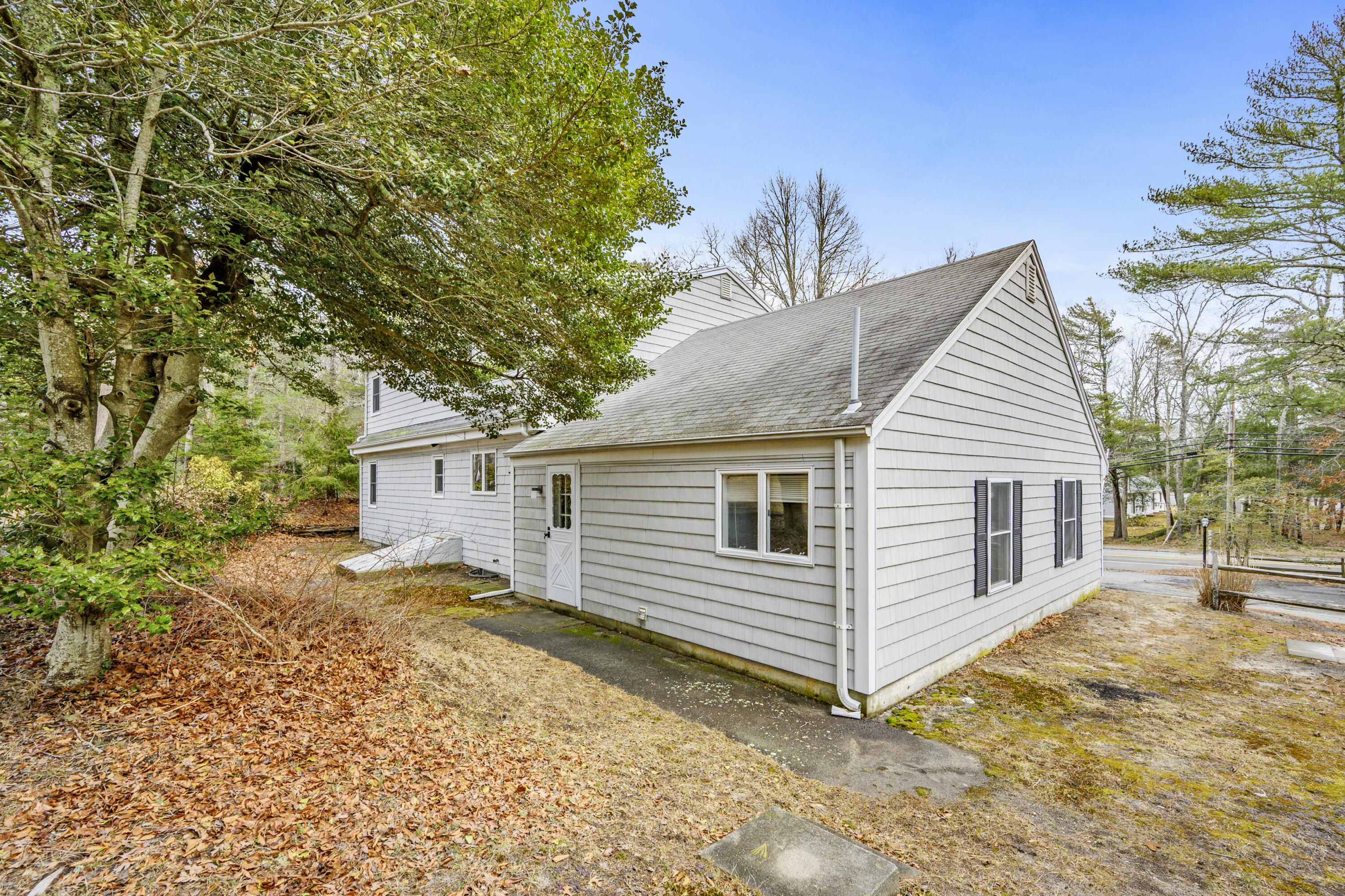 33 Head Of The Bay Road Buzzards Bay, MA 02532 - Photo 33 of 46 a view of a house with a yard