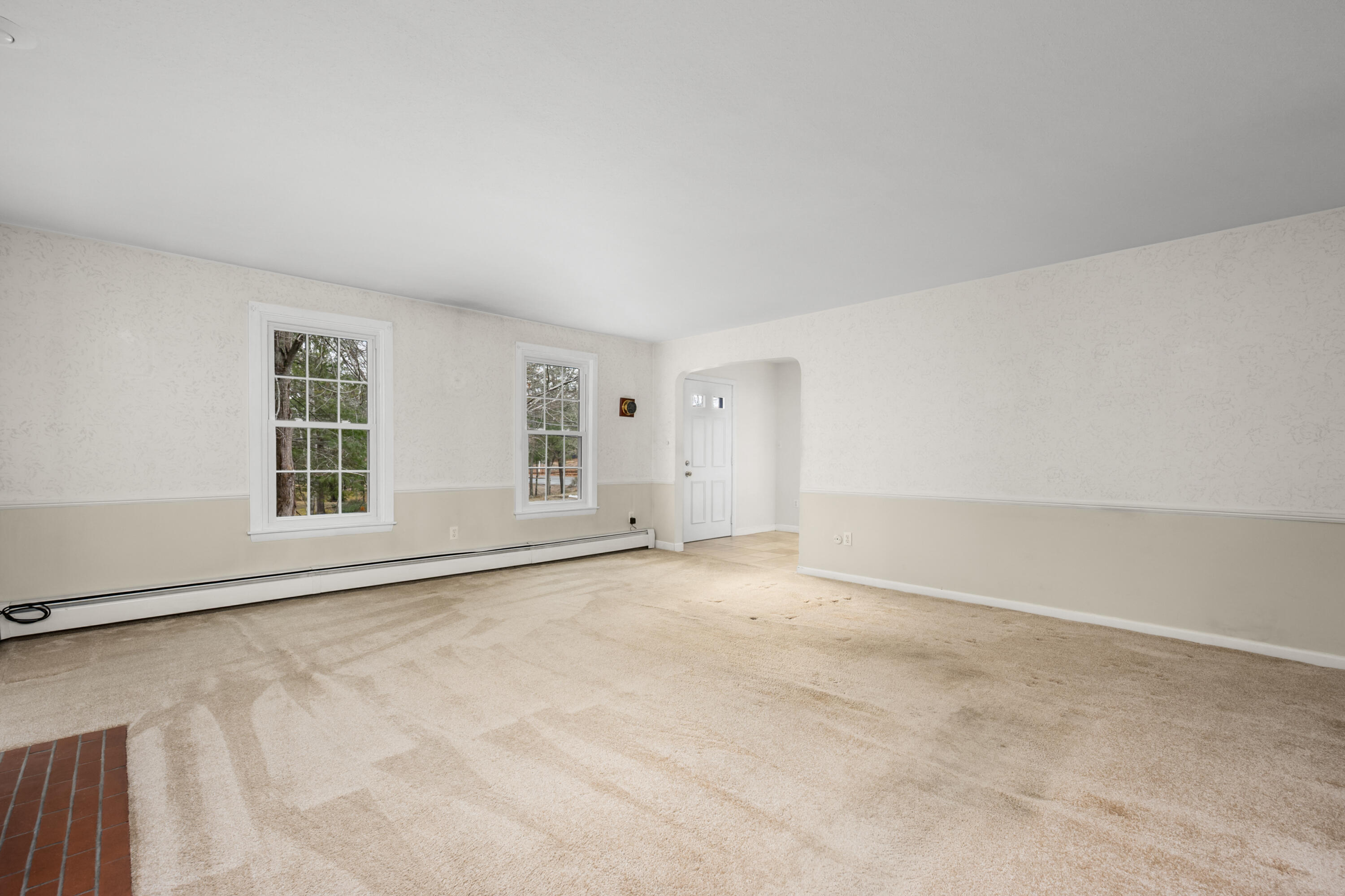 33 Head Of The Bay Road Buzzards Bay, MA 02532 - Photo 8 of 46 an empty room with windows