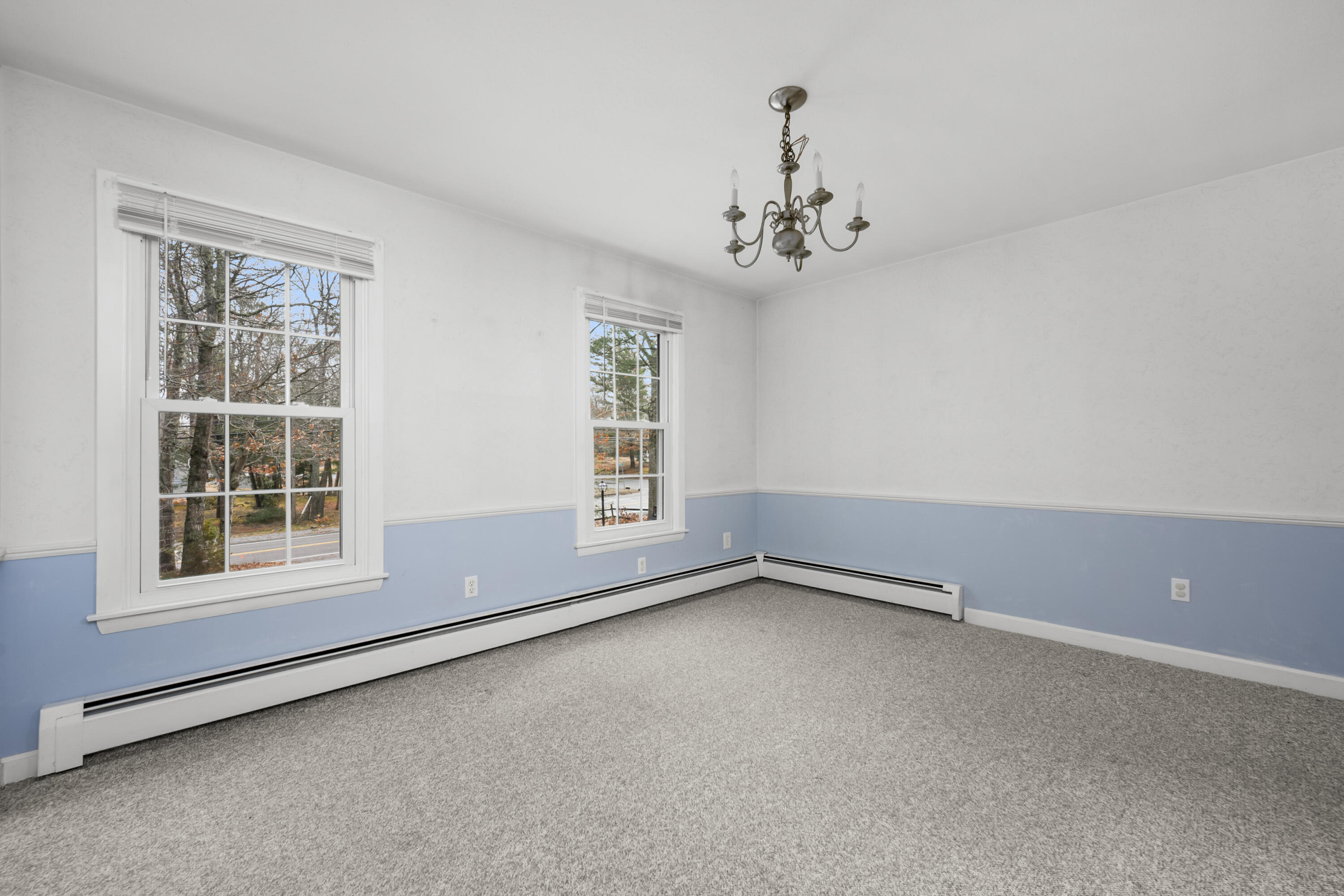 33 Head Of The Bay Road Buzzards Bay, MA 02532 - Photo 10 of 46 an empty room with a empty space and windows