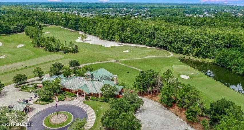 955 Registry Boulevard, Unit 210 St. Augustine, FL 32092 - Photo 31 of 31 an aerial view of a residential houses with outdoor space and trees all around